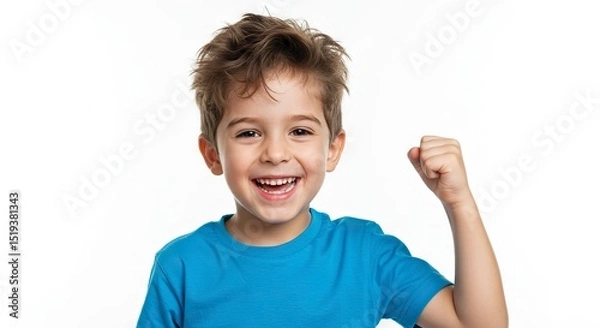 Fototapeta Excited Boy Cheering with Raised Fist in Studio Portrait on White