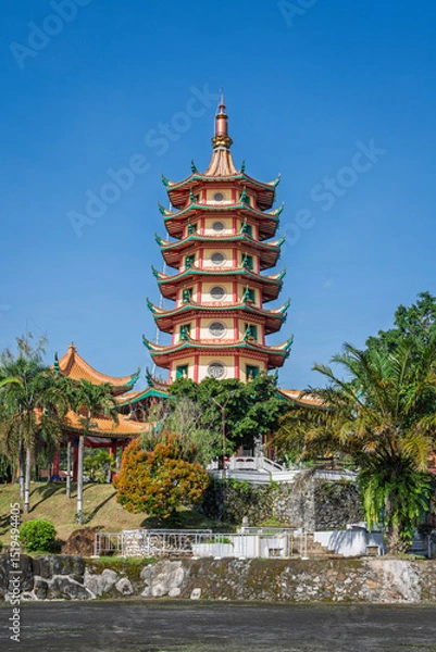 Fototapeta Vertical landscape view of landmark Avalokitesvara or Guanyin pagoda at Vihara Buddhagaya Watugong, Semarang, Central Java, Indonesia
