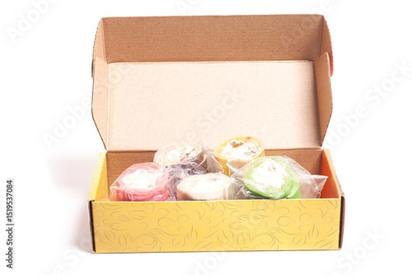Obraz Pieces of tasty halva in a box