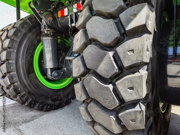 Obraz Large quarry transportation vehicle with heavy-duty tires for effective operation and maneuverability in rugged environments