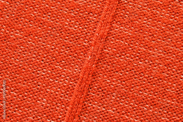 Obraz Red purl wool jersey fabric texture with a seam in the center as background