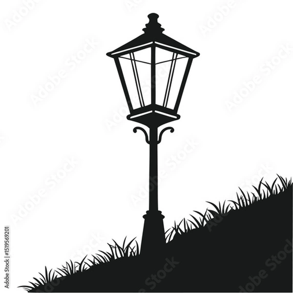 Obraz Silhouette of a vintage street lamp standing on a grassy hill slope