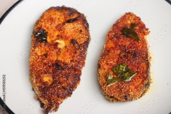 Obraz Indian fish fry, Basa or Pangasius, pan fried, marinated with spices