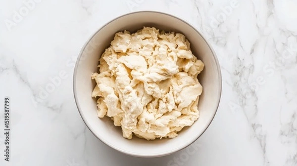 Fototapeta Freshly Made Butter in a Bowl on Elegant Marble Surface