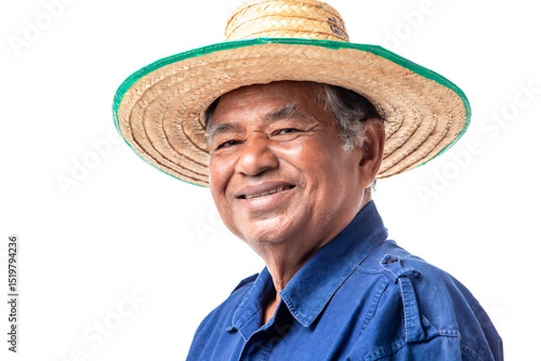 Fototapeta Portrait of smiling senior Asian farmer wear a hat and looking at camera isolated on white background. Clipping path