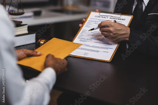 Obraz Lawyer receiving envelope with money for bribery. Corrupt lawyer receiving a bribe in an office, showcasing unethical behavior in law and finance. Hands accept money envelope.