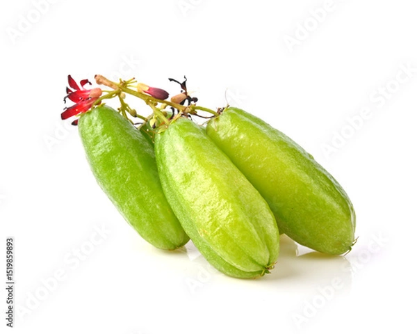 Obraz starfruit (Averrhoa bilimbi L.) belimbing wuluh. Averrhoa bilimbi fruits or Belimbing slice on a white background