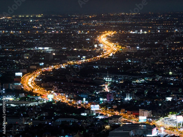Fototapeta Expressway, Self-driving autonomous electric cars of the future with HUD elements move along a busy traffic intersection. Concept: Artificial Intelligence, Car Scan, GPS Tracking, Smart Roads, IoT