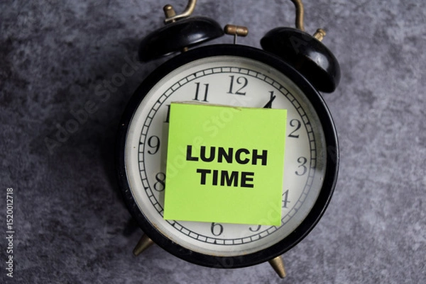Obraz Concept of Lunch time write on sticky notes isolated on Wooden Table.