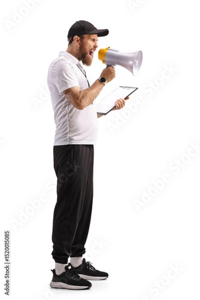 Fototapeta Full length profile shot of a sports coach shouting with a megaphone
