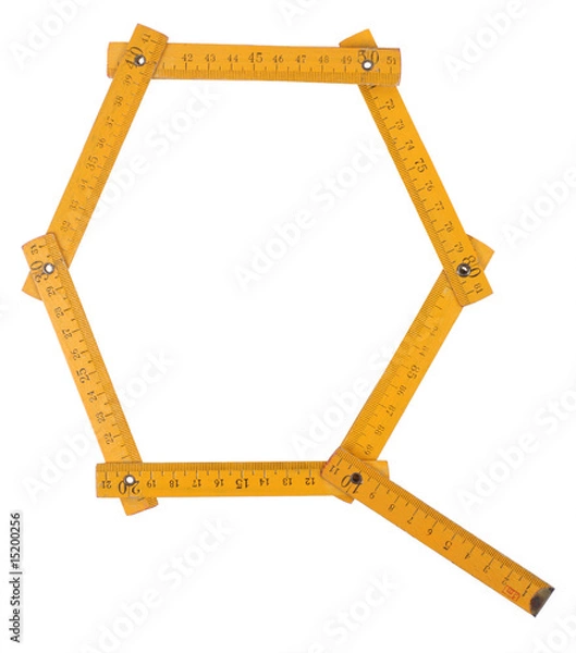 Obraz old yellow ruler forming font symbol Q