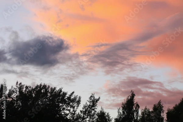 Fototapeta A sunset sky with soft clouds.