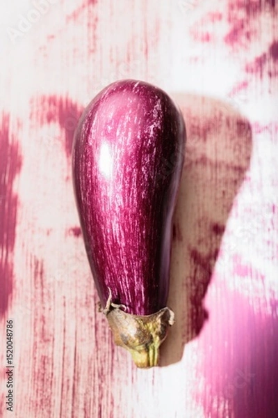 Obraz An eye-catching eggplant artwork adorns a wall in the heart of a city, showcasing colorful graffiti techniques