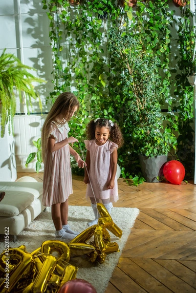 Obraz girls, Sisters joyfully embracing each other in a lush and cozy living space filled with warmth