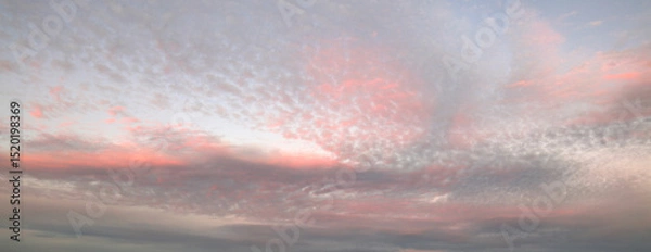 Obraz Sunlit clouds in sky