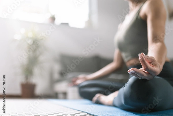 Obraz Practicing mindfulness and meditation in a calm indoor space during morning hours