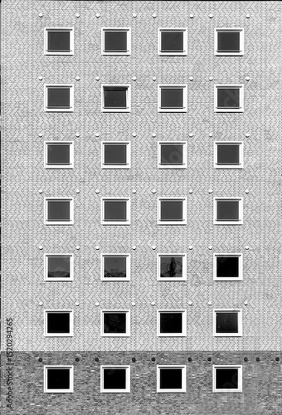 Fototapeta pattern of brick wall of a skyscraper in harmonic style