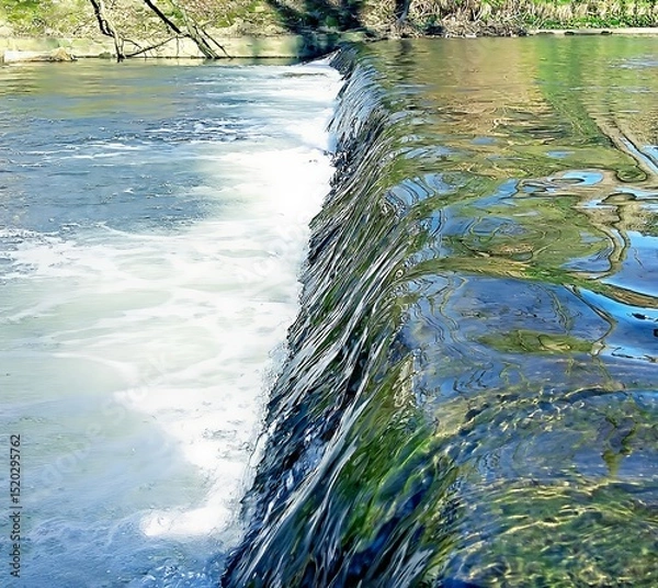 Fototapeta Wildlife. Mountain river. Thresholds of water sources. Transparent water. Movement of water in nature. Close-up. refreshing condition Wallpaper. Postcard