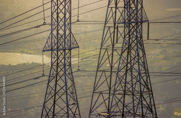 Obraz High voltage power lines and transmission towers at sunset