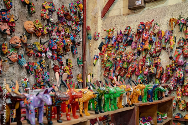 Obraz Guatemalan artisan masks and wooden figurines resembling alebrijes