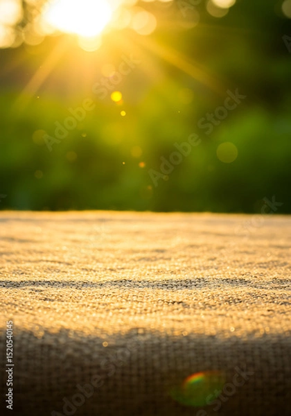 Fototapeta Sunlit Surface Texture: A textile texture bathed in the bright glow of the sun's rays, capturing the warm ambiance of a sunny day and adding depth and visual interest to the image.