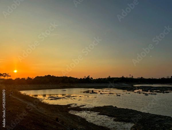 Fototapeta Tranquil View of Talay Prong Lake at Dusk in the Countryside of Nakhon Si Thammarat, Thailand