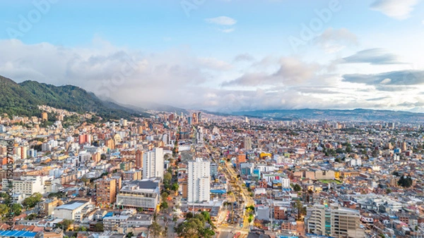 Fototapeta Aerial View of Bogota, Colombia with Urban Landscape and Mountains in Background