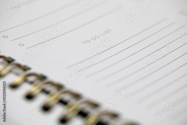 Fototapeta closeup of a blank to do list in a spiral notebook