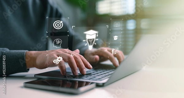 Fototapeta Online education and digital learning concept. Hands typing on a laptop with education icons such as diploma, brain, and target, ideal for e-learning platforms, digital skill development.