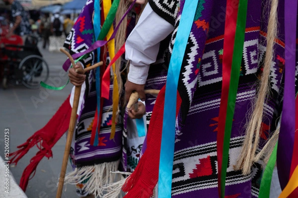Obraz Vibrant costumes and masks in Danza de los Viejitos performance in Mexico