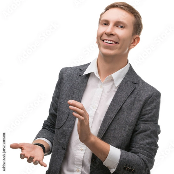 Fototapeta Smiling man in suit offering presentation with confident body language