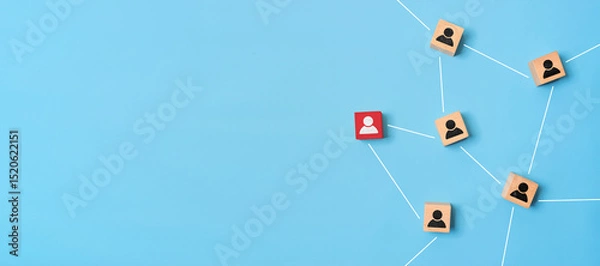 Obraz Wooden cubes with person icon on blue background, Organisation structure, social network and community concepts