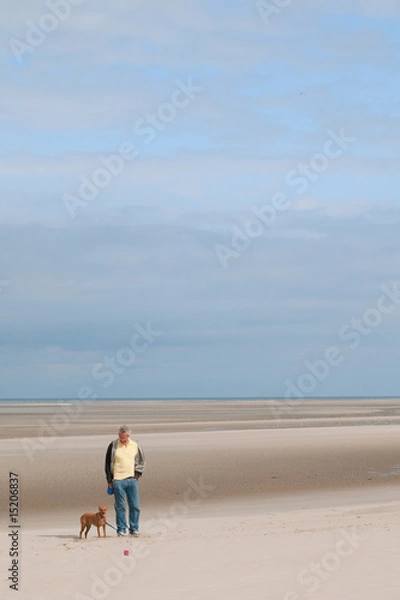 Fototapeta Empty beach with a man