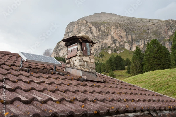 Obraz Small photovoltaic panel on the roof of a refuge in the Dolomites area