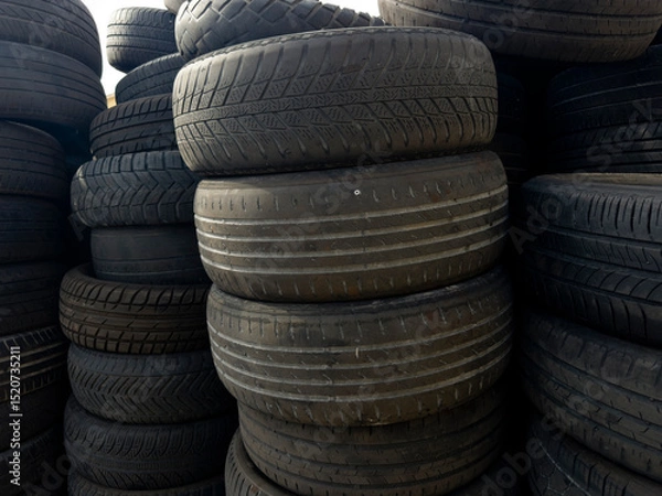 Obraz Industrial storage of used tires for recycling and sustainable environmental management