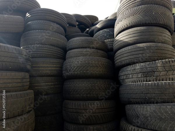 Obraz Industrial storage of used tires for recycling and sustainable environmental management