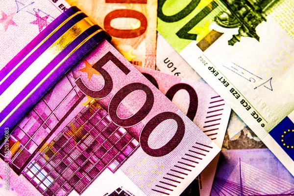 Fototapeta A pack of European currency lies on the background of the Euro