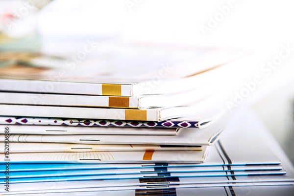 Fototapeta stack of magazines in library