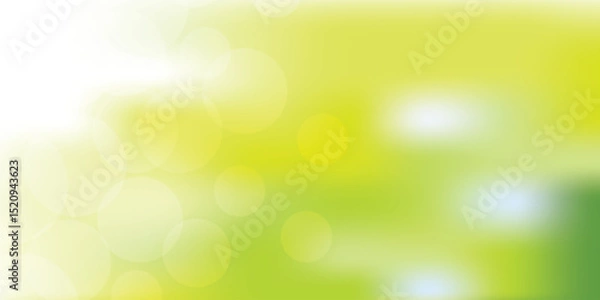 Fototapeta A soft green, white, and yellow bokeh background evokes tranquility, nature, and relaxation, making it ideal for ecological, environmental, and sustainability-themed designs.