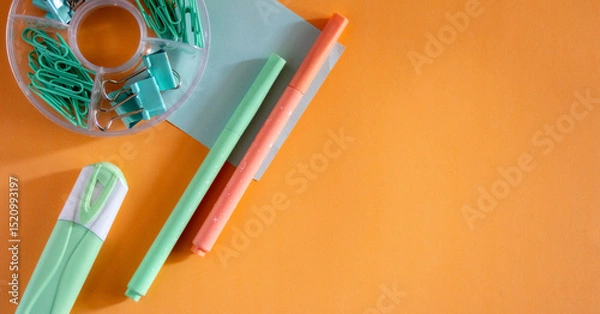 Obraz  Minimalist Flat Lay of Student Supplies on Soft colors arranged on a vibrant background.