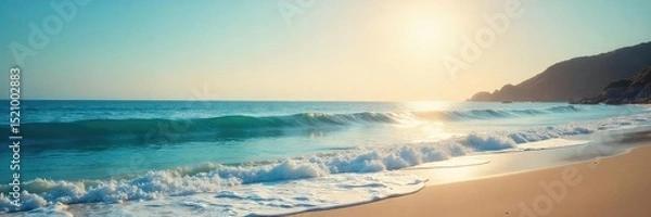 Fototapeta Vast, tranquil ocean stretching to the hazy horizon Sun-kissed waves gently lap the shore, creating a serene coastal scene Perfect for travel, nature, and serenity themes , beach, panorama, tranquil
