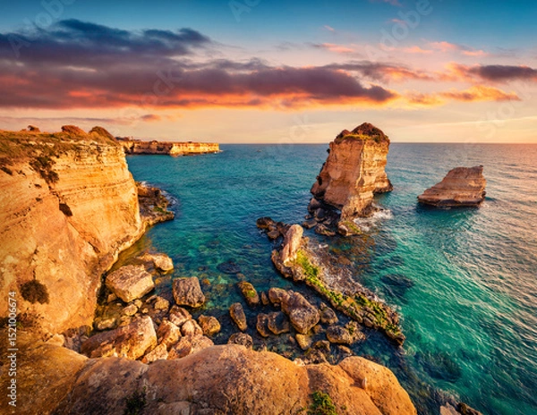 Obraz Fantastic summer sunrise on popular tourist attraction - Torre Sant'Andrea. Wonderful morning seascape of Adriatic sea, Torre Sant'Andrea village location, Apulia region, Italy, Europe.