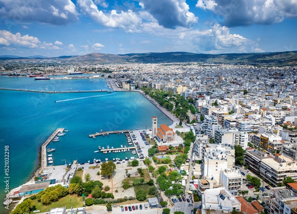 Obraz Panoramic aerial view of the cityscape of Volos, Magnesia, Greece, with Agios Konstantinos church and yacht marina