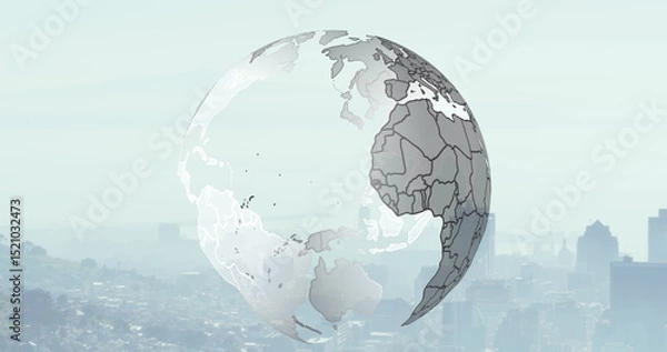 Fototapeta Image of spinning globe over cityscape