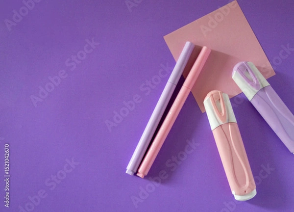 Obraz Top-down view of modern school supplies, such as pencils, notes, markers in purple background