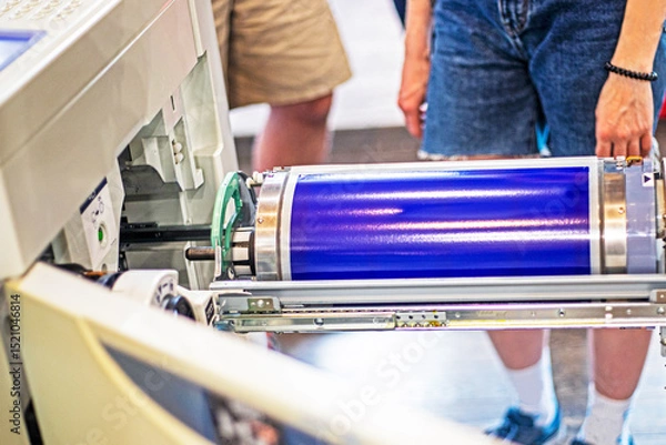 Fototapeta change drum with environmentally friendly rice-based blue paint in risograph