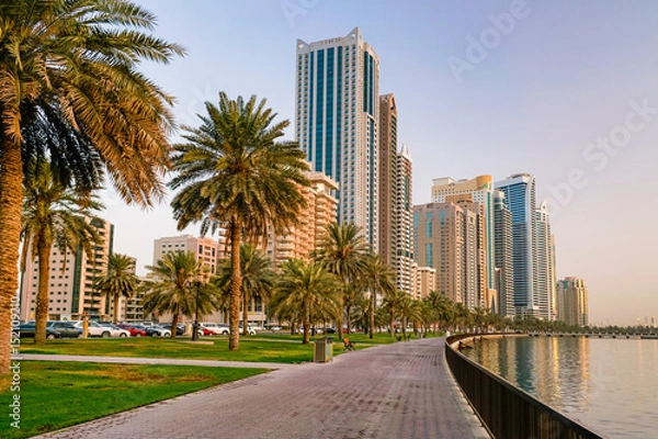 Fototapeta Sharjah. In the summer of 2016. The cultural capital of the UAE, a modern urban metropolis at the dawn of day.
