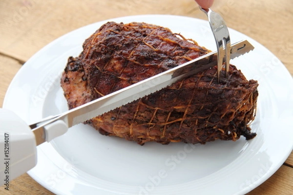 Fototapeta Rollbraten mit Gabel