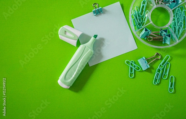Obraz Back to School Flat Lay with cool Supplies on Bright green Background