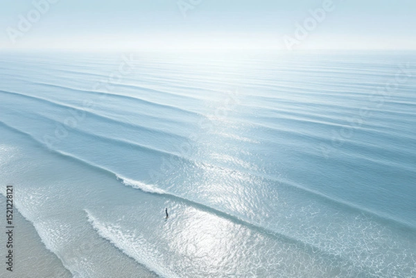 Fototapeta breathtaking aerial view of ocean surface stunning reflections of sunlight on water